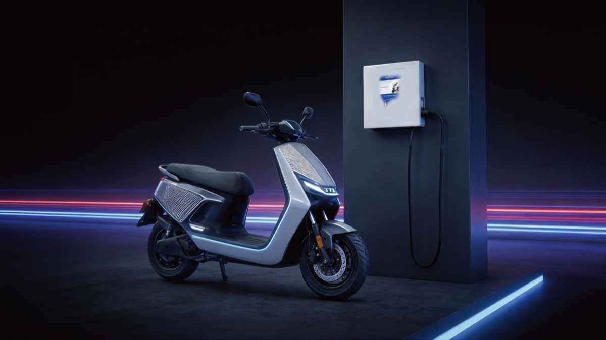 CELERCH DC fast charger connected to an electric scooter